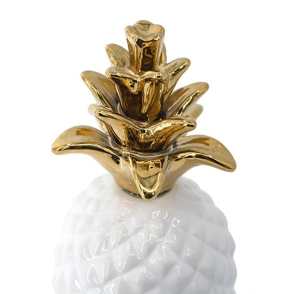 White Pineapple with a Gold Crown Ornament